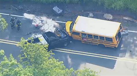 pickup truck crashes head on into day camp bus in north jersey report says