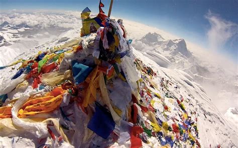 The Summit Of Mount Everest Littered With Flags From Climbers Pics Mount Everest Climbers