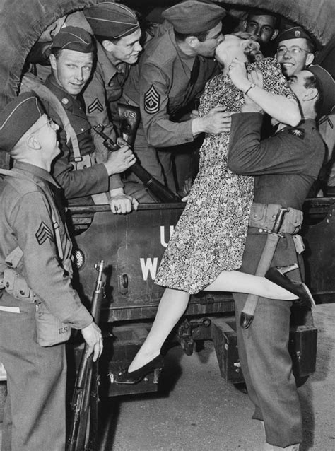 Embracing Love Amidst War Iconic Vintage Captures Of Soldiers Sharing Tender Farewells