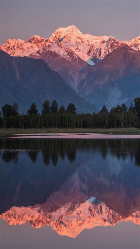 Snowcapped Mountains Cook And Fox Reflected In Lake