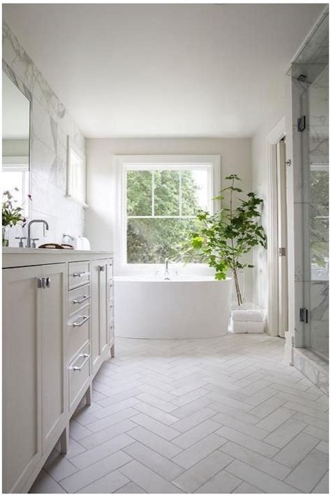 Ideally, as you are planning on using the same tile vertically as well as on the floor, you can no matter the tile size, the enemy of your circumstances is the eye, however your approach to your solution should be tailored to your tile size. Help with floor tile for herringbone pattern in master bath