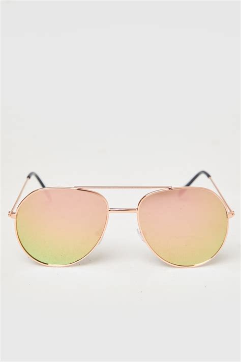 Pink Lens Aviator Sunglasses In The Style