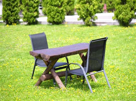 Two Chairs And Wooden Table In Nature Stock Image Image Of Wood