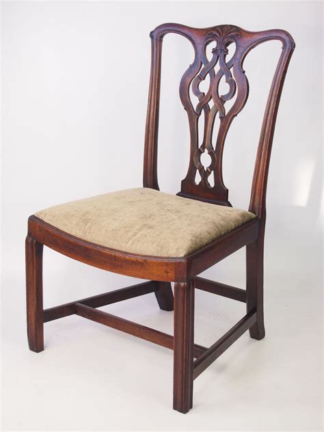 The chairs have bent frontal legs that are finished with spheres confirmed by an experienced expert in vintage. Antique Georgian Mahogany Chippendale Chair Stamped "AF"