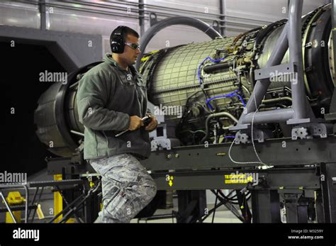Performs Pre Test Checks On An F110 Ge 129 Engine Used On An F 16