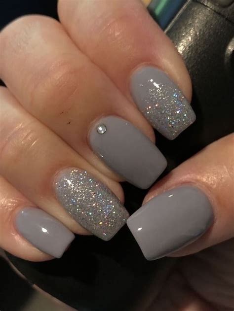 Popular Nail Colors Dark Grey Nail Polish With Silver Glitter On The