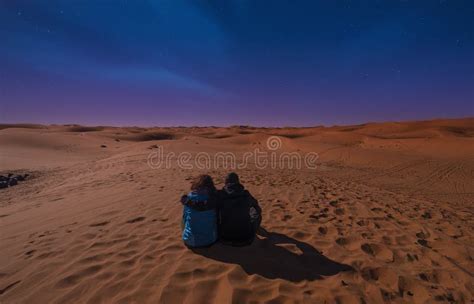 Night Landscape With Loving Couple In The Sahara Desert Near Merzouga Morocco Editorial Stock