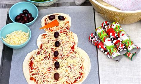 Shhh…we have one more surprise. Christmas snowman pizza recipe - Kidspot