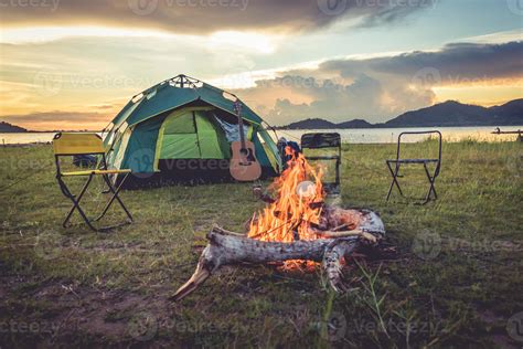Camping Tent With Bonfire In The Green Field Meadow 3410579 Stock Photo