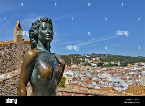Bronze Statue Of Ava Gardner Looking At Panorama Of Tossa De Mar Spain