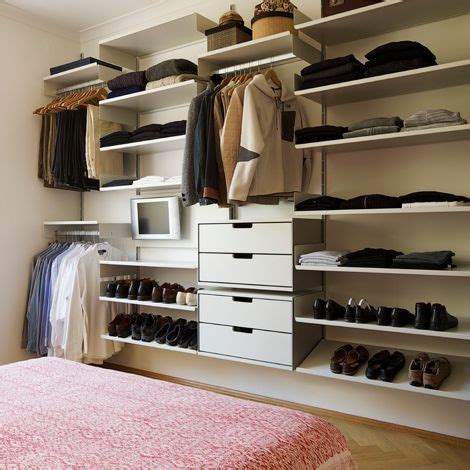 Child's bedroom with custom cabinetry and reading nook tagged: Open shelving in bedroom or dressing room from Vitsoe ...
