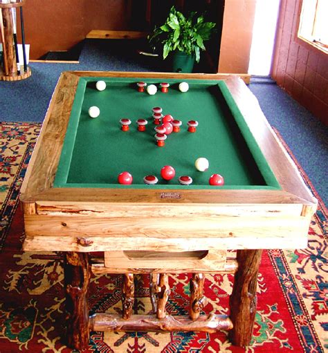 Different brands design bumper pools of various sizes. Rustic Bumper Pool Table built from distressed logs ...