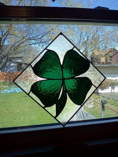 Stained glass refers to glass that has been colored by metallic oxides during the manufacturing process. Shamrock with light shining through. | Stained glass ...