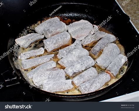 Chopped Eels In Flour Being Fried In A Pan A Traditional Danish Dish