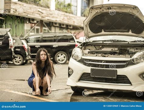 Worried Asian Japanese Woman In Stress Stranded On Roadside With Car