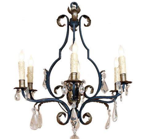 Wrought iron becomes easily bendable when heated, due to low. 20 Wrought Iron Chandeliers | Home Design Lover