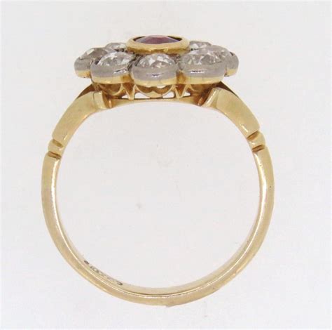 Edwardian Ruby And Diamond Cluster Ring Berridges Jewellers Ipswich