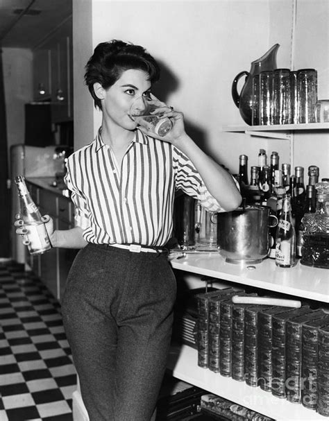 Model And Actress Nancy Berg Enjoys A Cocktail 1955 Photograph By