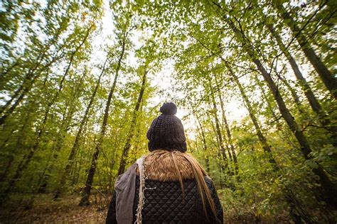 Young Woman Walking Through The Forest Free Stock Photo | picjumbo