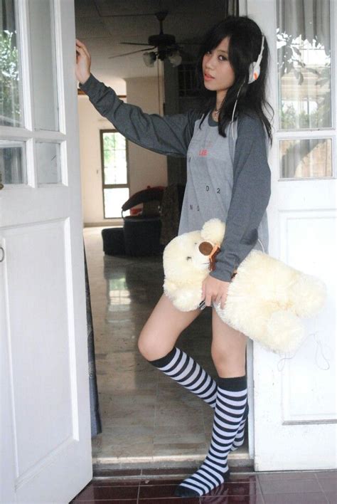 Asian Indonesian Emo Girl With Teddy Bear And Headset