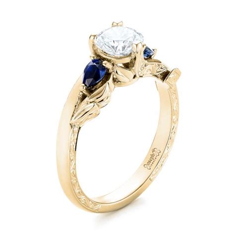 Our designer engagement rings and designer wedding rings are inspired by the fashion trends of today and the timeless beauty of the past. 14k Yellow Gold Custom Three Stone Blue Sapphire And Diamond Hand Engraved Engagement Ring ...