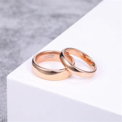A stunning combination of timeless style and understated color, these vibrant options are an increasingly popular way to symbolize your love. Rose Gold Tungsten Mens Womens Wedding Band Plain High ...