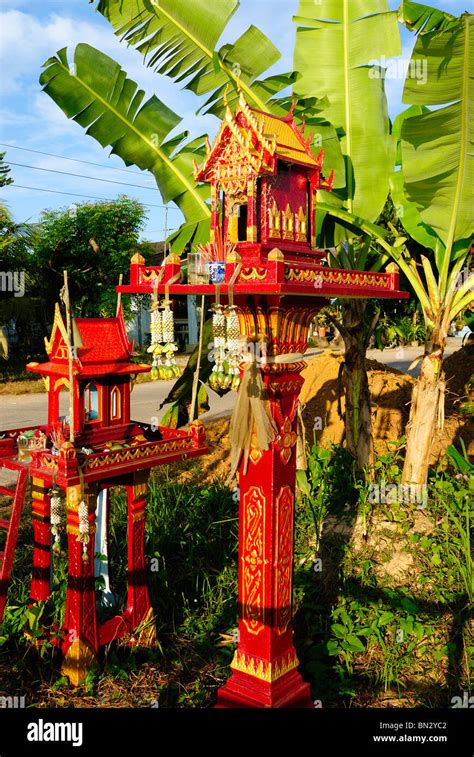 Small Wood Buddhist Temple In A Backyard Of A House In Thailand Stock