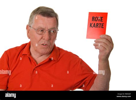 Old Man Showing Red Card Stock Photo Alamy