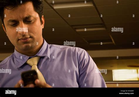 Businessman Reading A Text Message Stock Photo Alamy