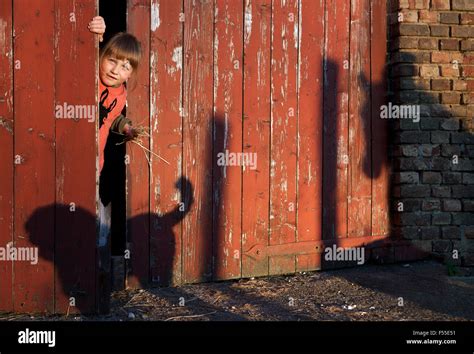 Girl Peeking Hi Res Stock Photography And Images Alamy