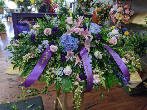We are committed to offering only the finest floral arrangements and gifts. Purple Casket Spray Krazy Daisy Flowers and Gifts ...