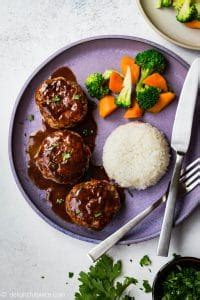 The patty is seasoned with the japanese flavor and coated with a thick sauce to serve with rice, not sandwiched in between the buns. Japanese Hamburg Steak (Hambagu) - Delightful Plate