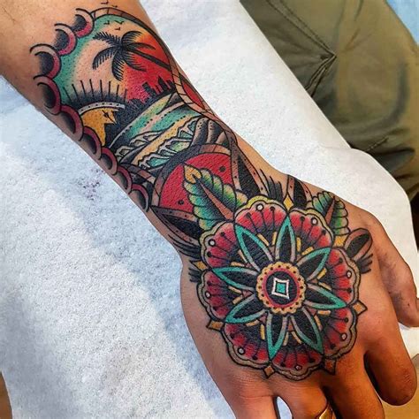 A Person With A Colorful Tattoo On Their Arm