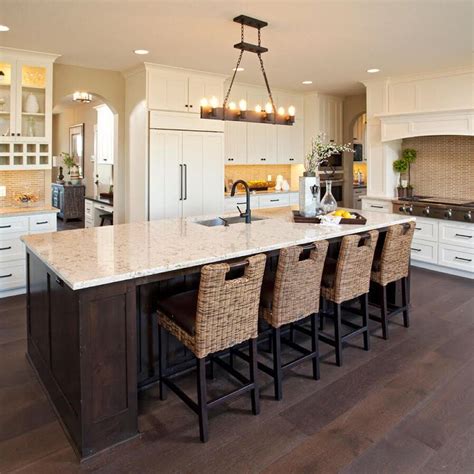 This Two Tone Kitchen Uses A Warm Neutral Palette For An Inviting