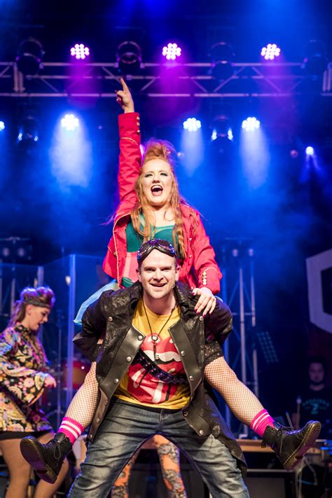 The character's name is a reference to the lyrics in the queen song bohemian rhapsody. We Will Rock You the Musical - Review - Sydney