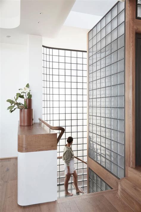 The Walls Of Glass Blocks Surrounding These Stairs Help To Provide