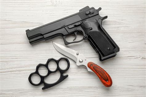 Set With Black Brass Knuckles Guns And Knife On White Background Top