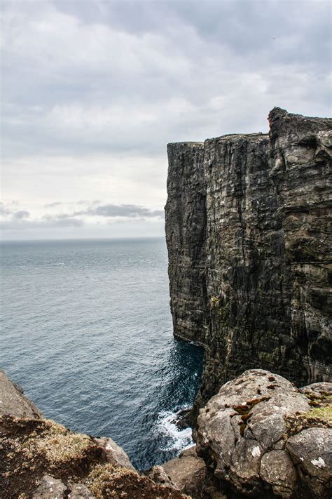 The faroe islands, beautiful and isolated, where people rugged, sheer, harrowing; How To See The Cliff Lake In The Faroe Islands ...
