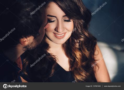 Close Up Portrait Of Beautiful Young Couple In Love Hugging Cute Brunette Girl And Her