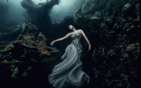 Models Dive 25 Meters To An Underwater Shipwreck For A Literally