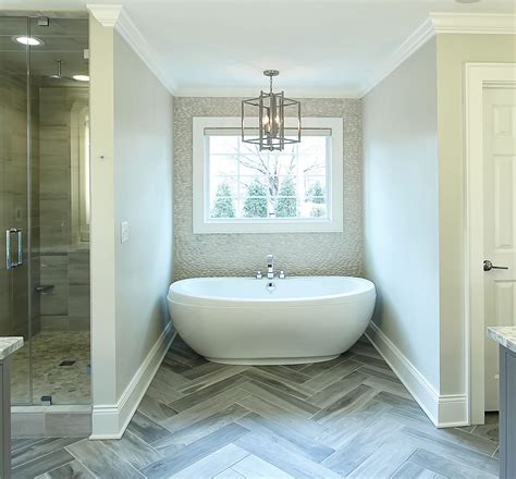 Master Bath Herringbone Floor Tile Pebble Backsplash Large Tub