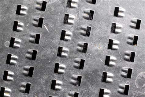 Close Up Of Metal With Holes Texture Or Background Stock Photo Image