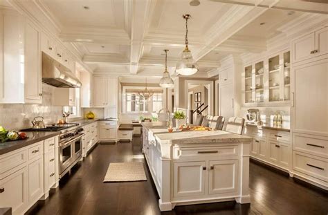 Massive White Kitchen With Ornate Coffered Ceiling In Galley Layout