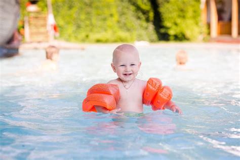 Cute Little Baby In Swimming Pool Stock Image Image Of Blue Learning