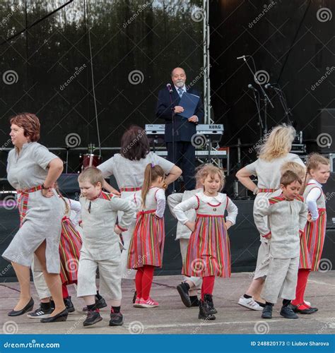 A Group Of Children Are Dancing A National Dance Estonian Folklore