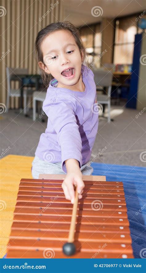 Young Girl Playing Xylophone Stock Image Image Of Xylophone Stick