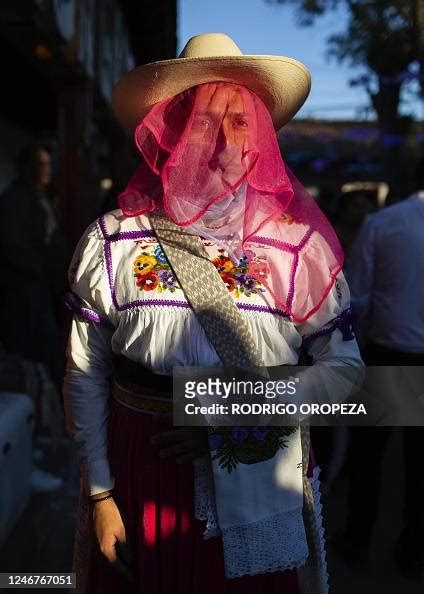 A Man Wearing A Traditional Attire Attends The Purepecha New Year