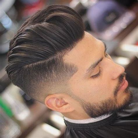 Skin fade pompadour + hair design. Pin on Pompadour Fade Haircuts