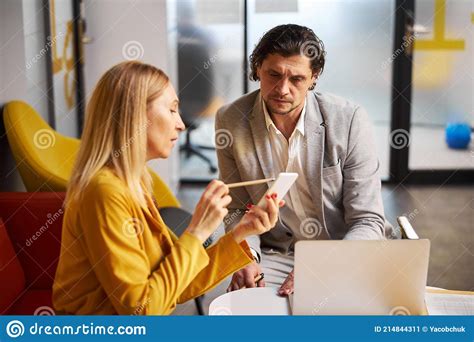 Concentrated Male Person Staring At Screen Of Gadget Stock Image
