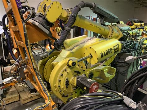 Fanuc robodrill with integrated fanuc robot and haeberle table. Used FANUC M900iA/600 6 AXIS CNC ROBOT WITH R30iA ...